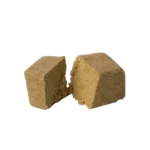 Hash Papaya CBD de Gorilla Grillz. Un polen beige con fragancia intensa a papaya y fondo terroso.