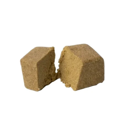 Hash Papaya CBD de Gorilla Grillz. Un polen beige con fragancia intensa a papaya y fondo terroso.